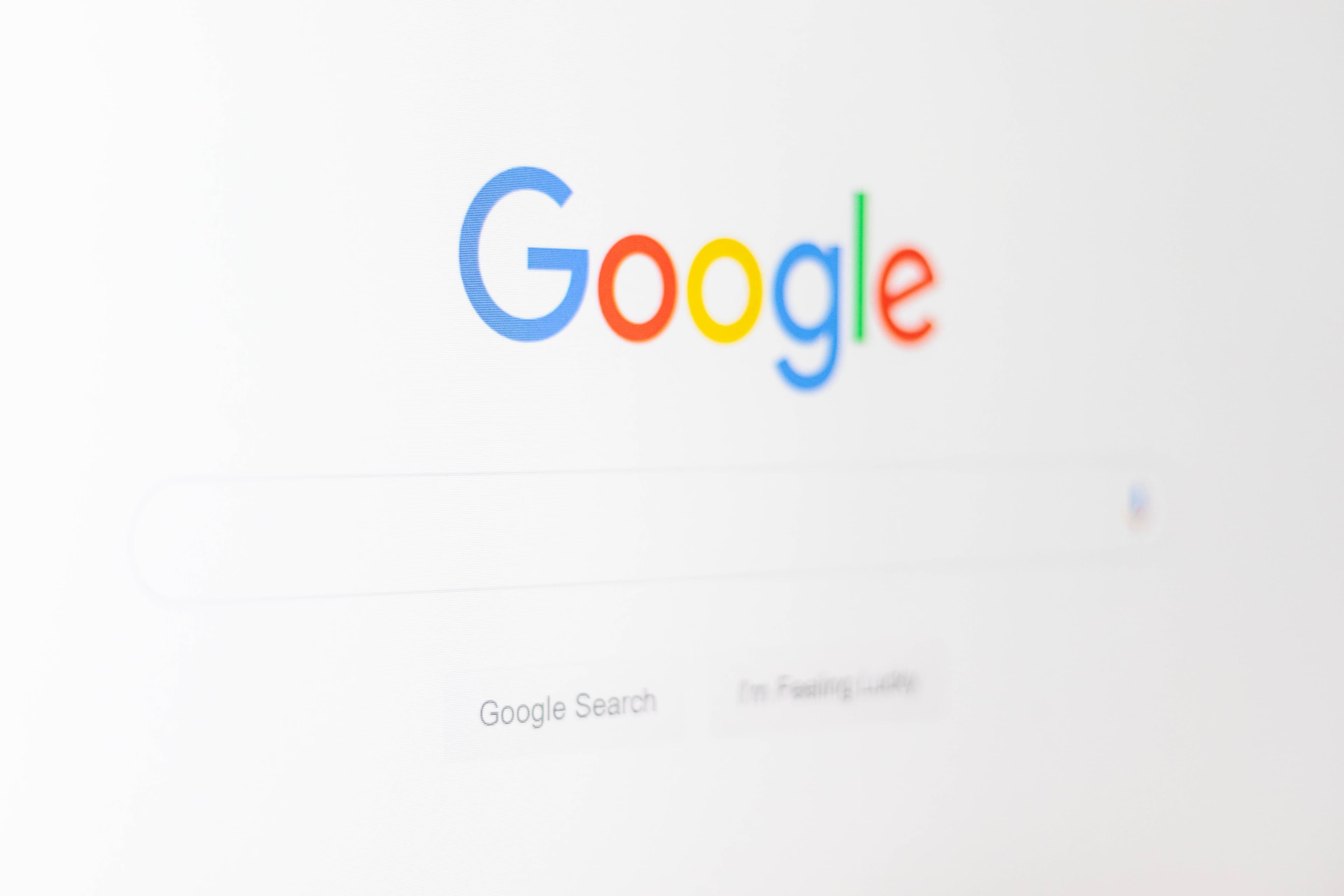 The Google search homepage filling a computer screen.