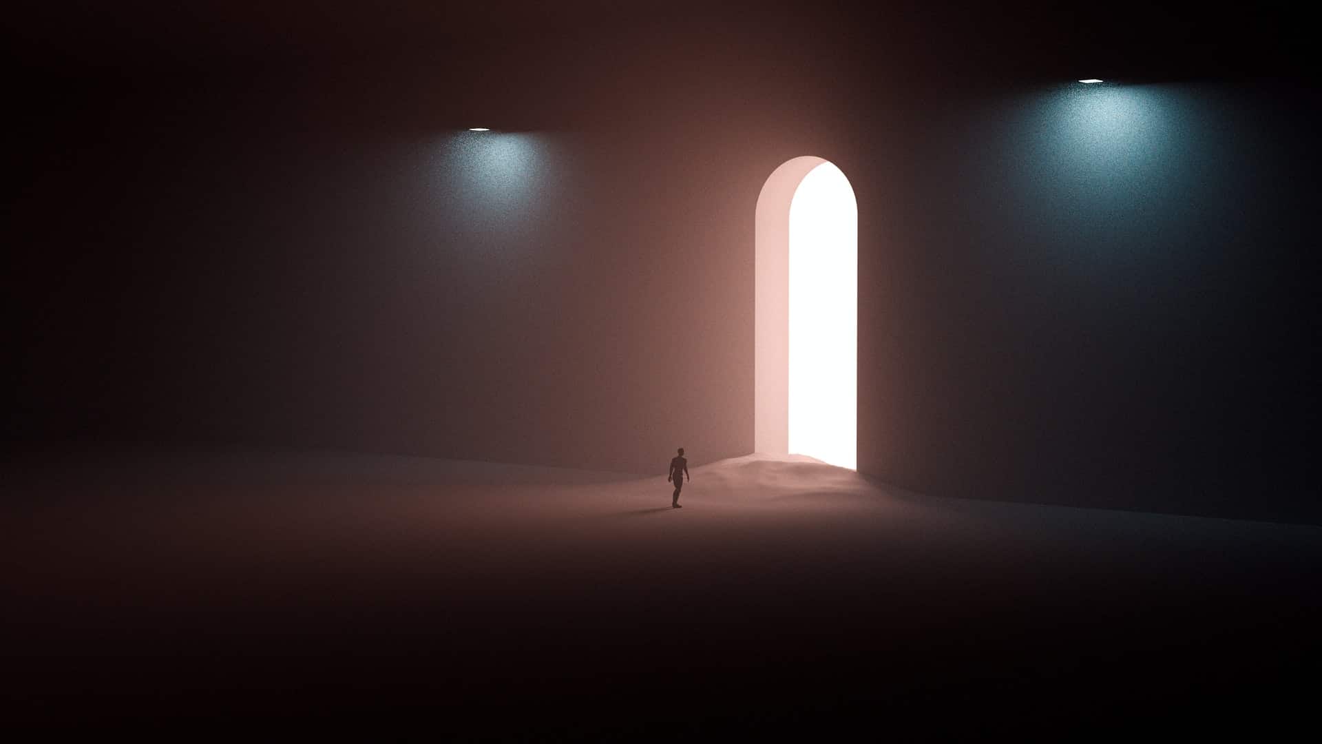 A small figure standing in front of a large brightly lit archway in a dark room.