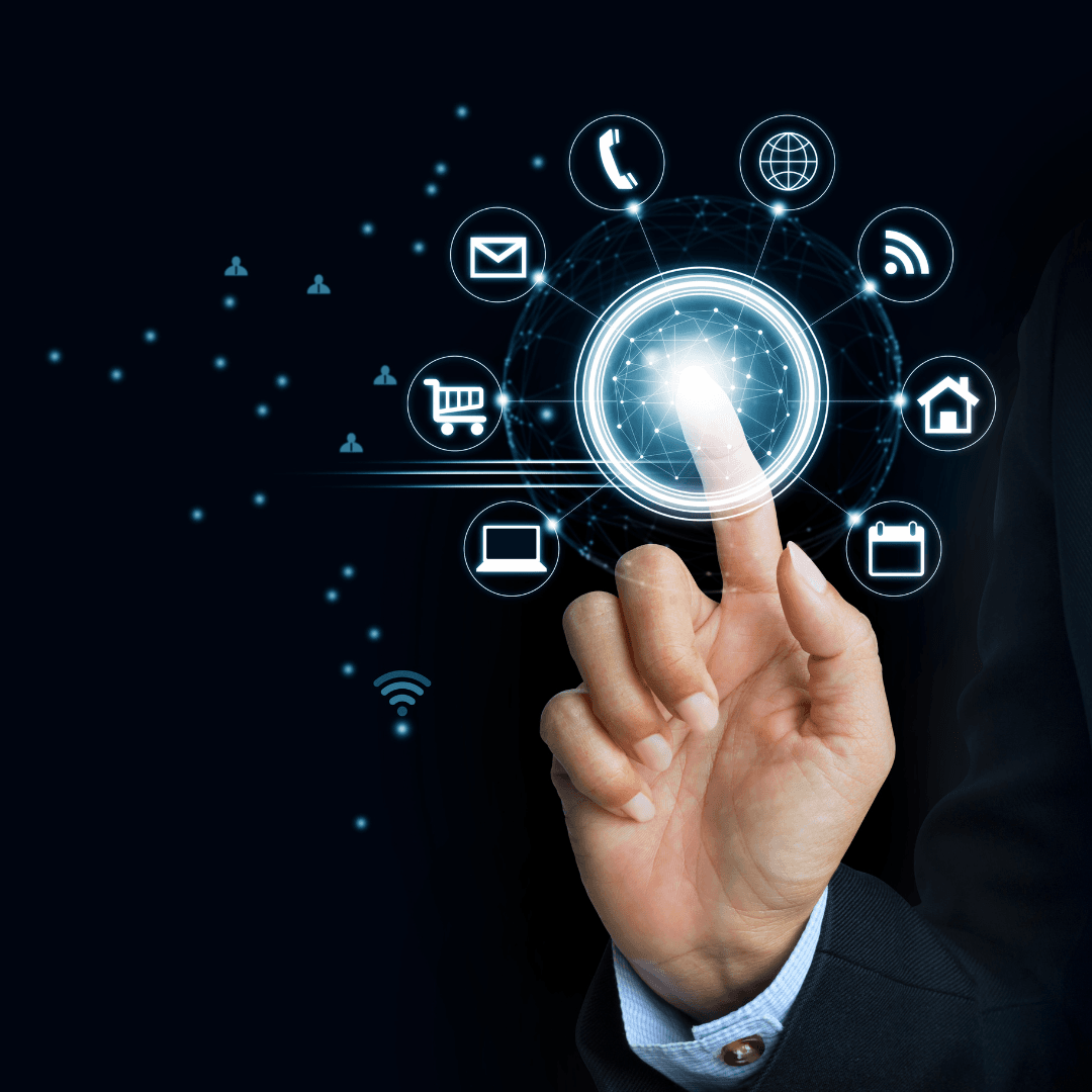 A hand pressing a glowing button surrounded by icons for email, phone, web, shopping and messaging.