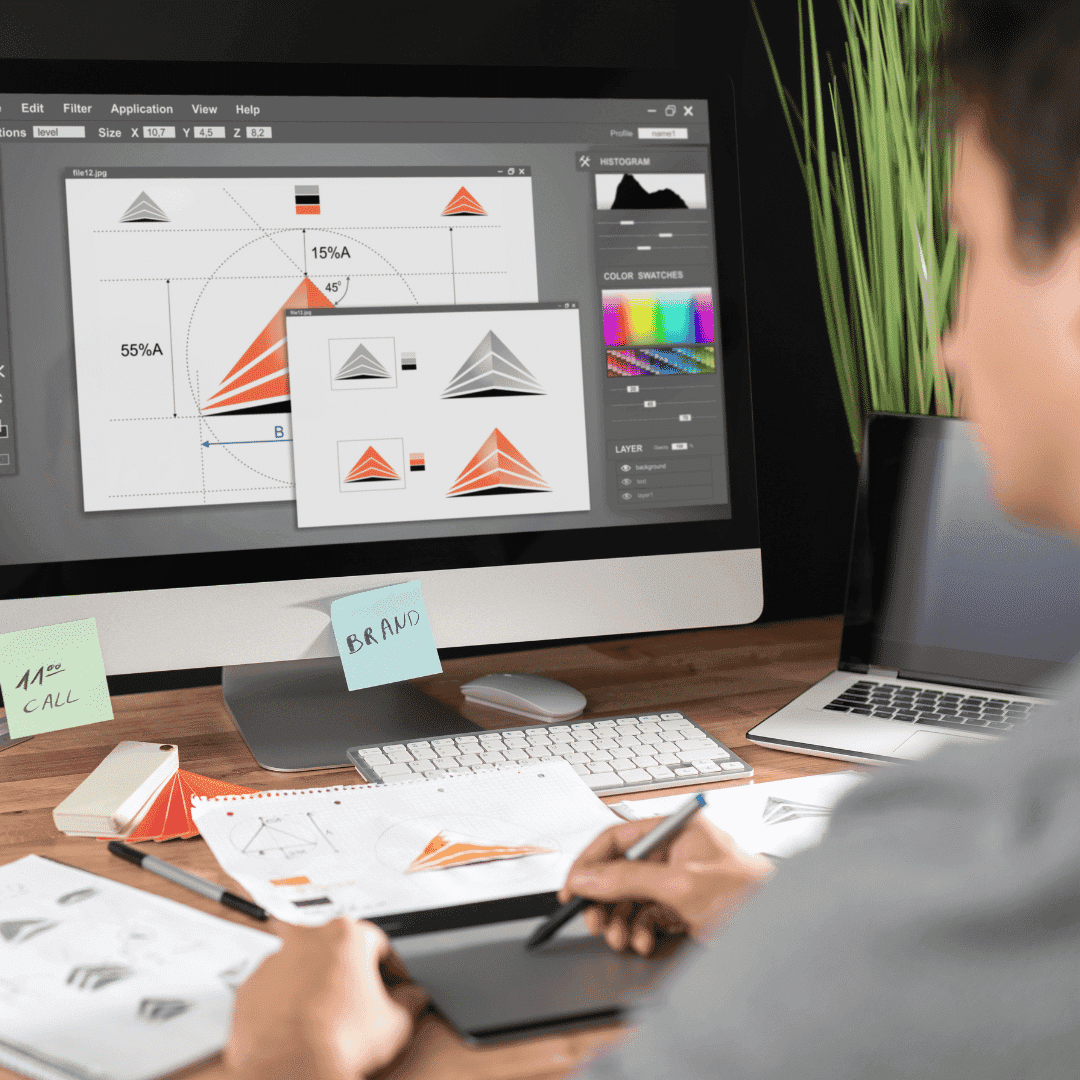 Man using desktop to design brand