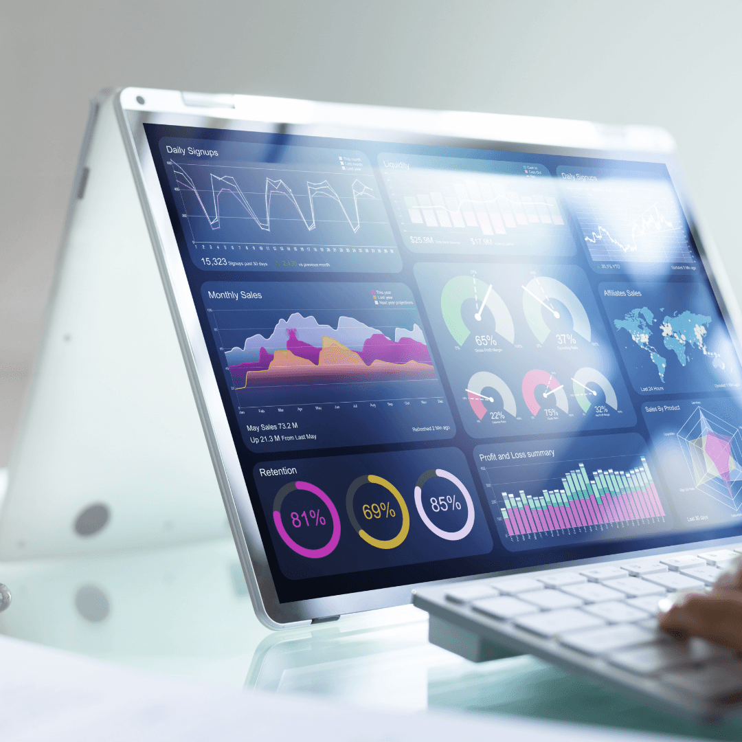 A convertible laptop displaying a colourful marketing analytics dashboard.