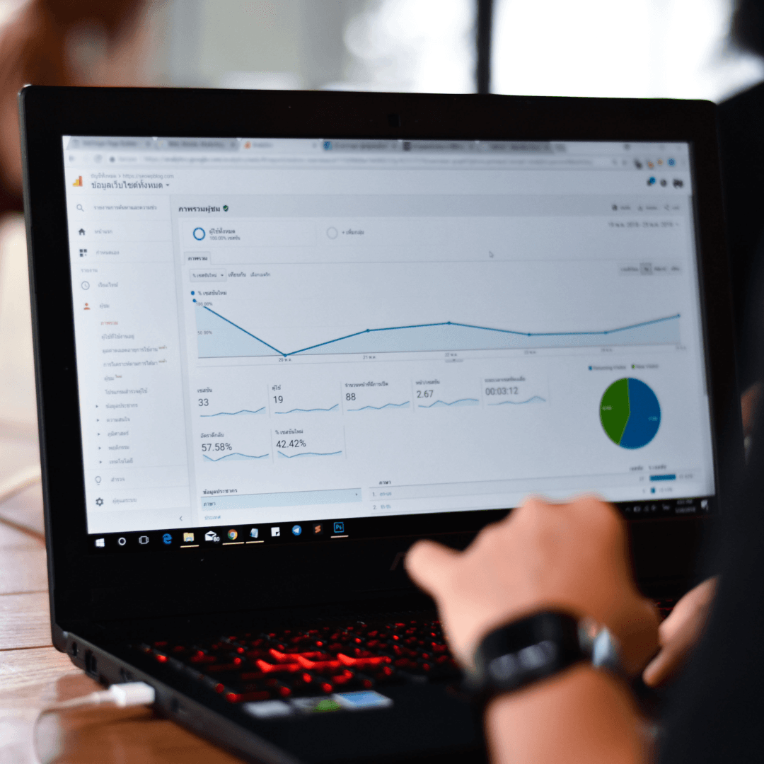 A laptop screen showing a Google Analytics traffic report.