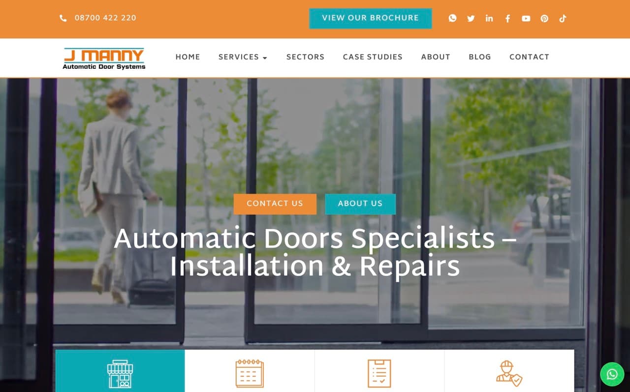 The J Manny Automatic Door Systems home page, showing a woman walking through automatic sliding doors under the headline "Automatic doors specialists, installation and repairs"