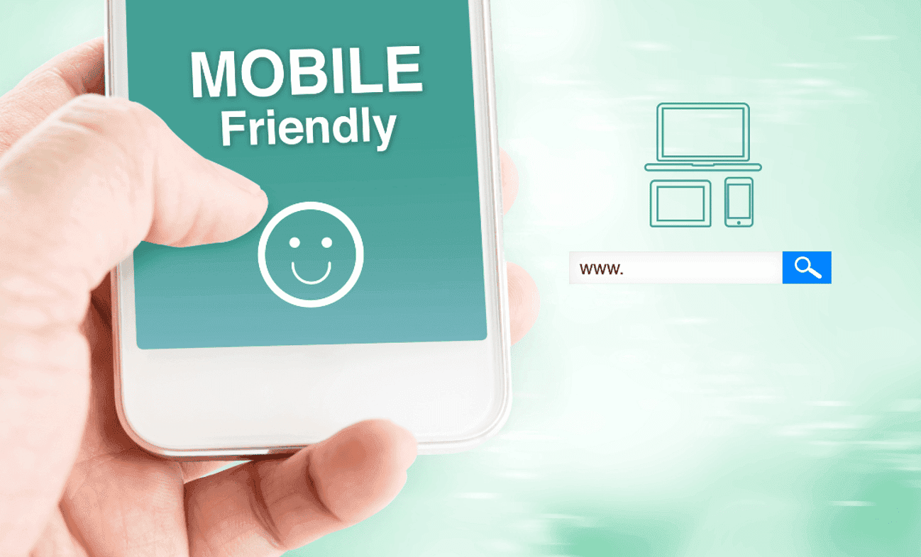 A hand holding a phone showing a Mobile Friendly message with a smiley face, beside a search bar and device icons.